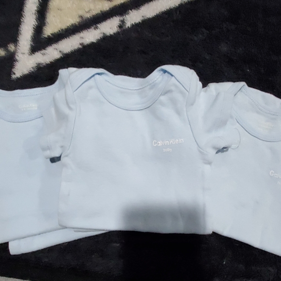 5 Calvin Klein Onesies - Picture 2 of 2